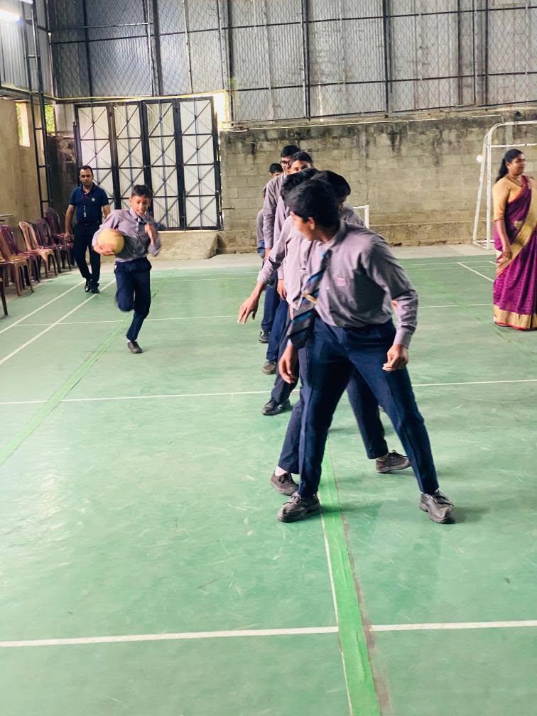 Students playing indoor games in the sports hall