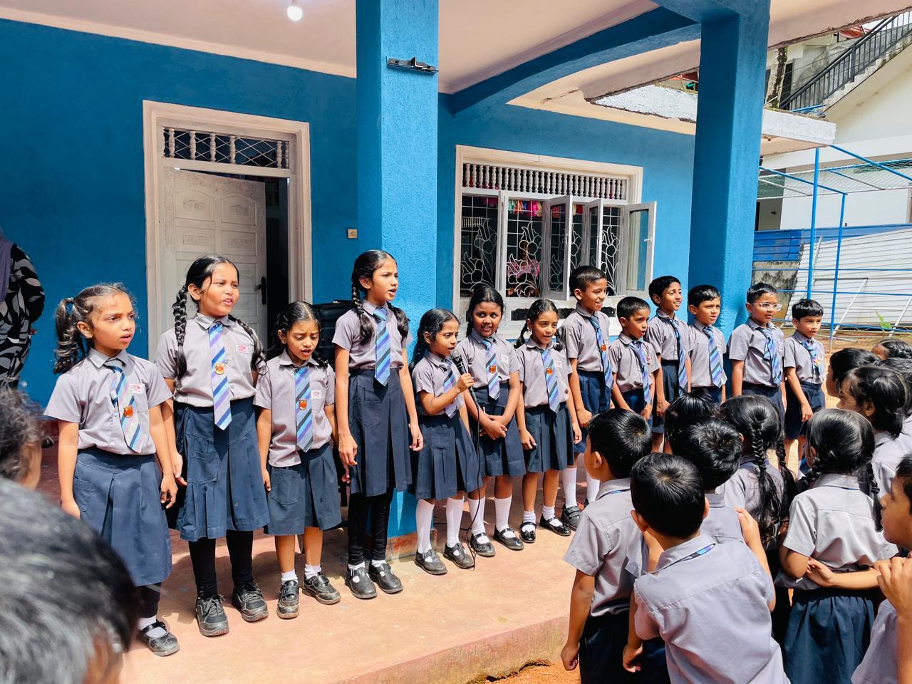Students singing at morning assembly